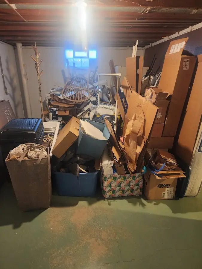 Roll-off dumpster container at job site for 6 Yard Dumpster Rental in East Flat Rock